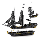 Navire pirate en blocs avec voiles noires à tête de mort, coque noire et ancres