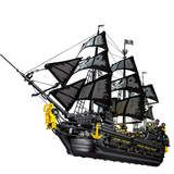 Navire pirate en blocs avec voiles noires texturées et pavillons tête de mort