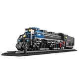 Locomotive à vapeur REOBRIX bleue et noire, vue 3/4 avant sur rail.