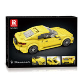 Boîte de jeu de construction NovaBrik REOBRIX 823 représentant une voiture de sport Maserati GranTurismo jaune en briques