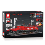Boîte de briques Vectron rouge avec schémas d’assemblage et inserts